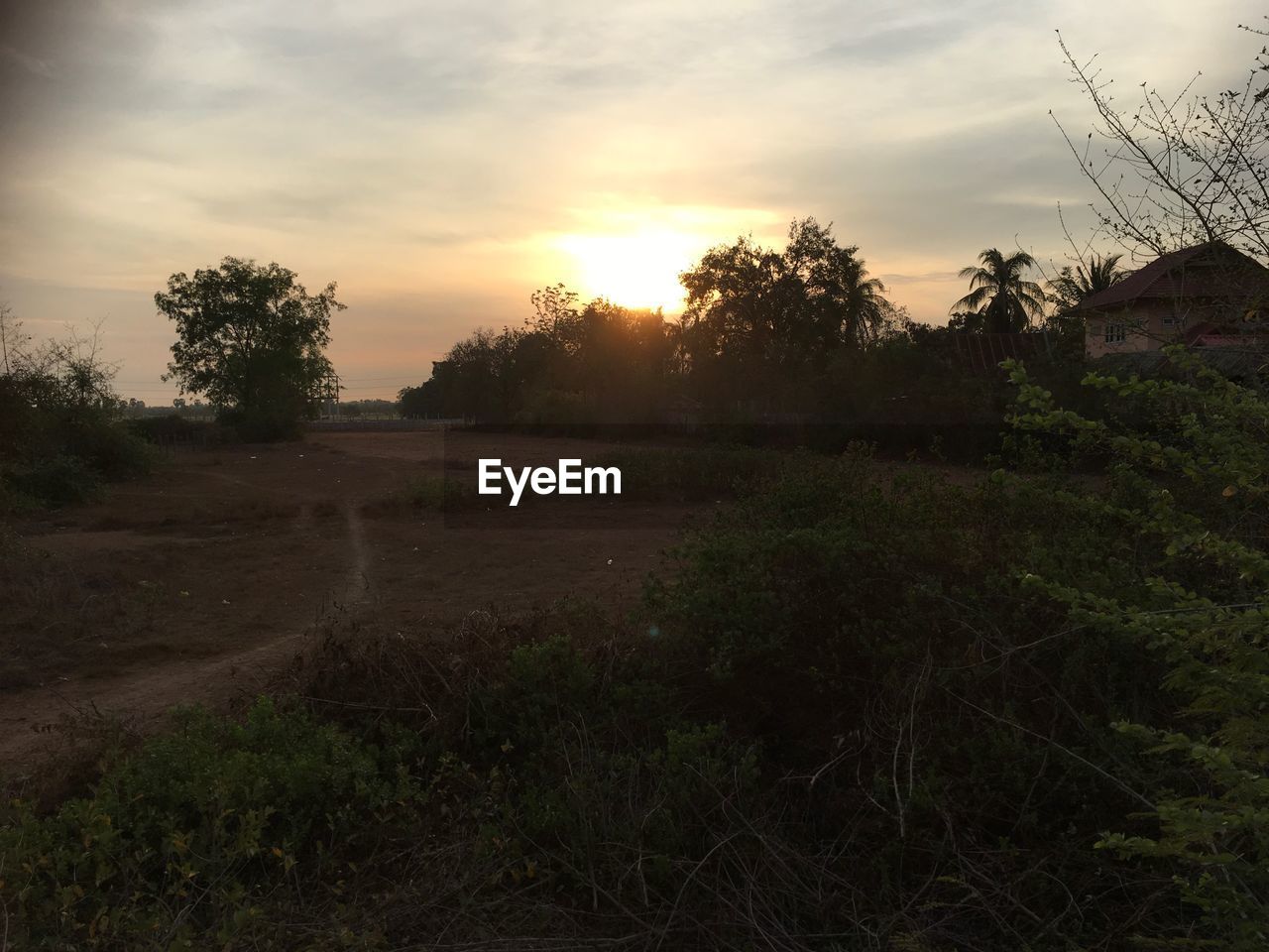 SCENIC VIEW OF SUNSET OVER LAND