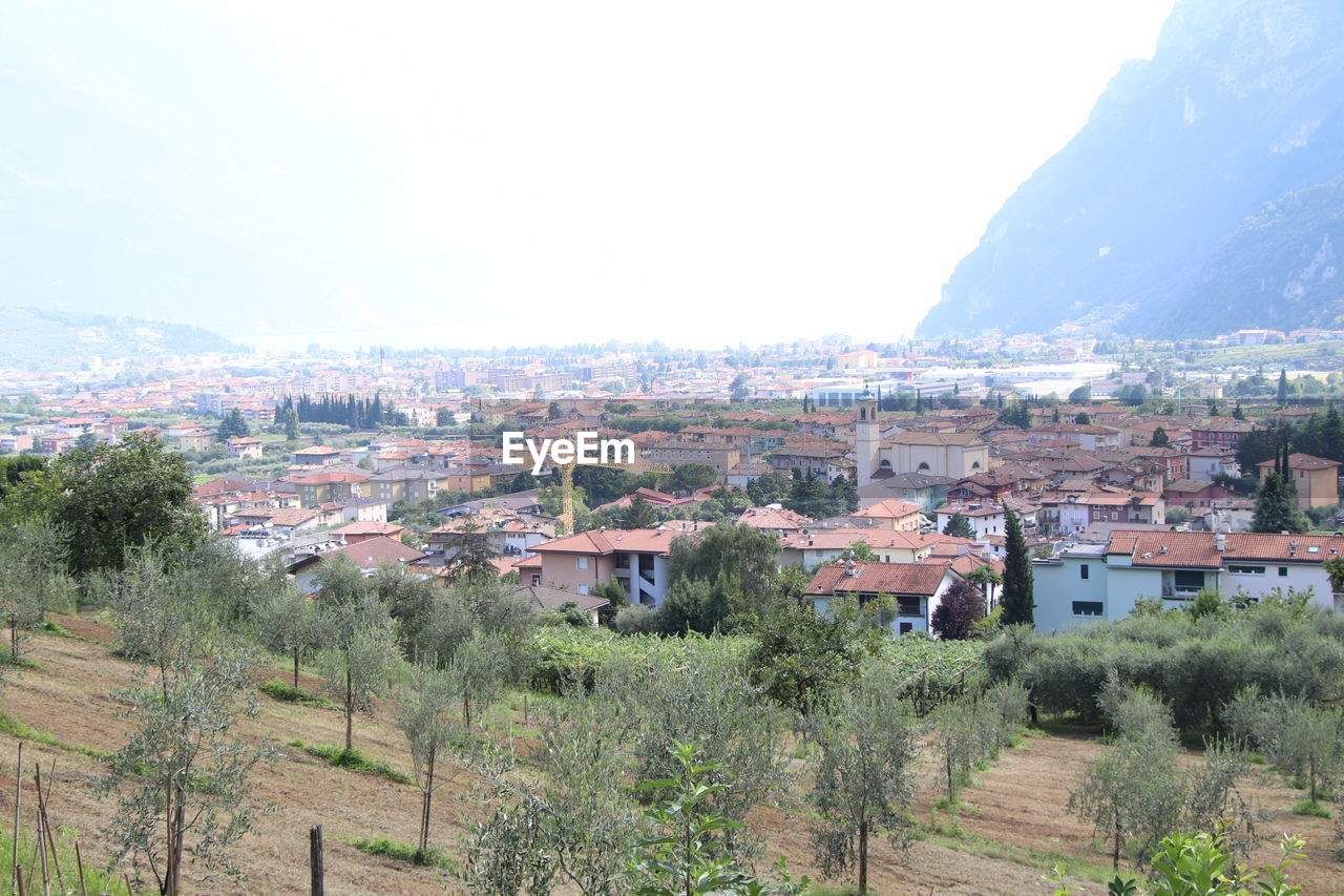 HIGH ANGLE SHOT OF TOWNSCAPE AGAINST CLEAR SKY