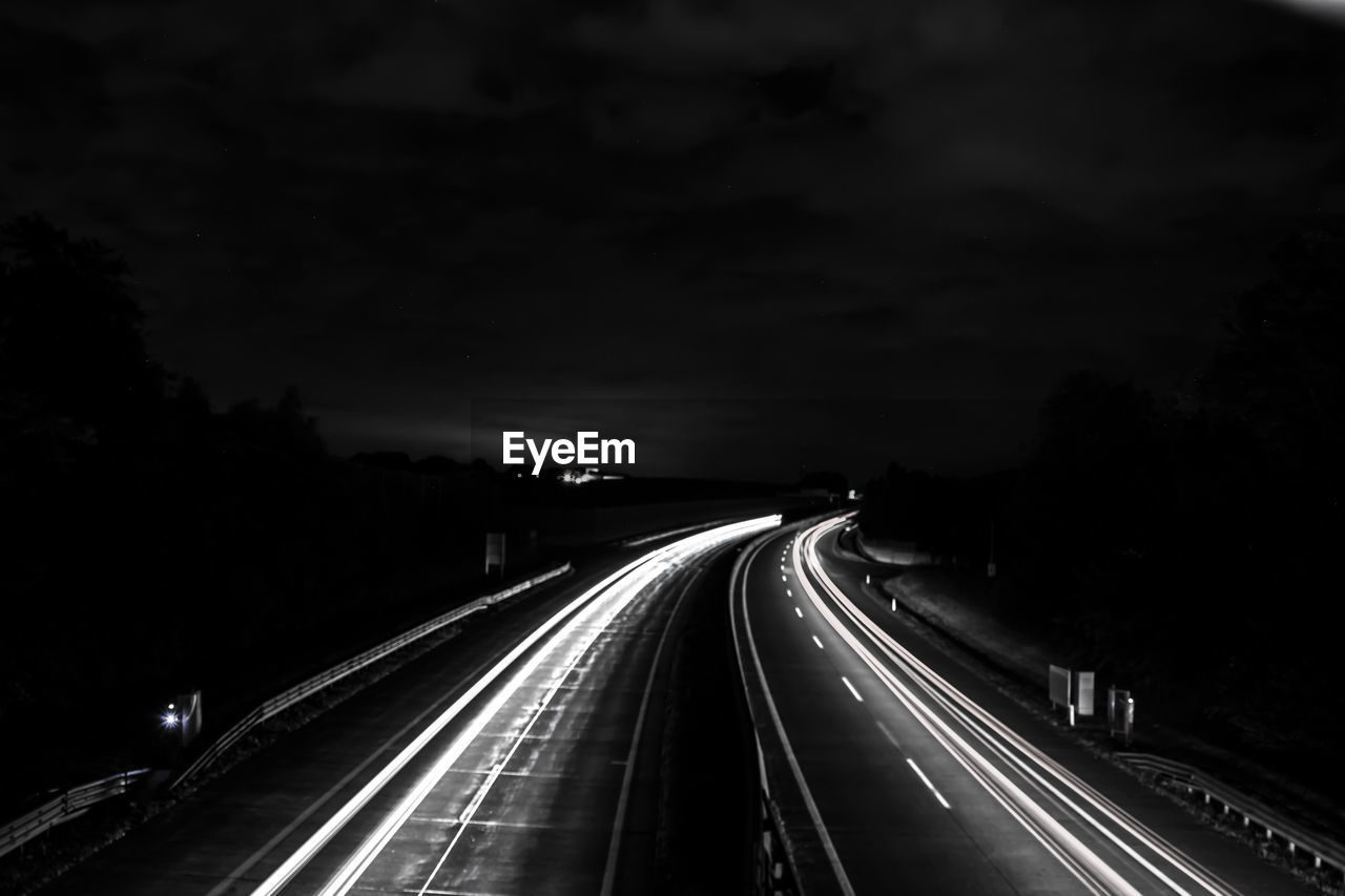 Cars moving on road at night