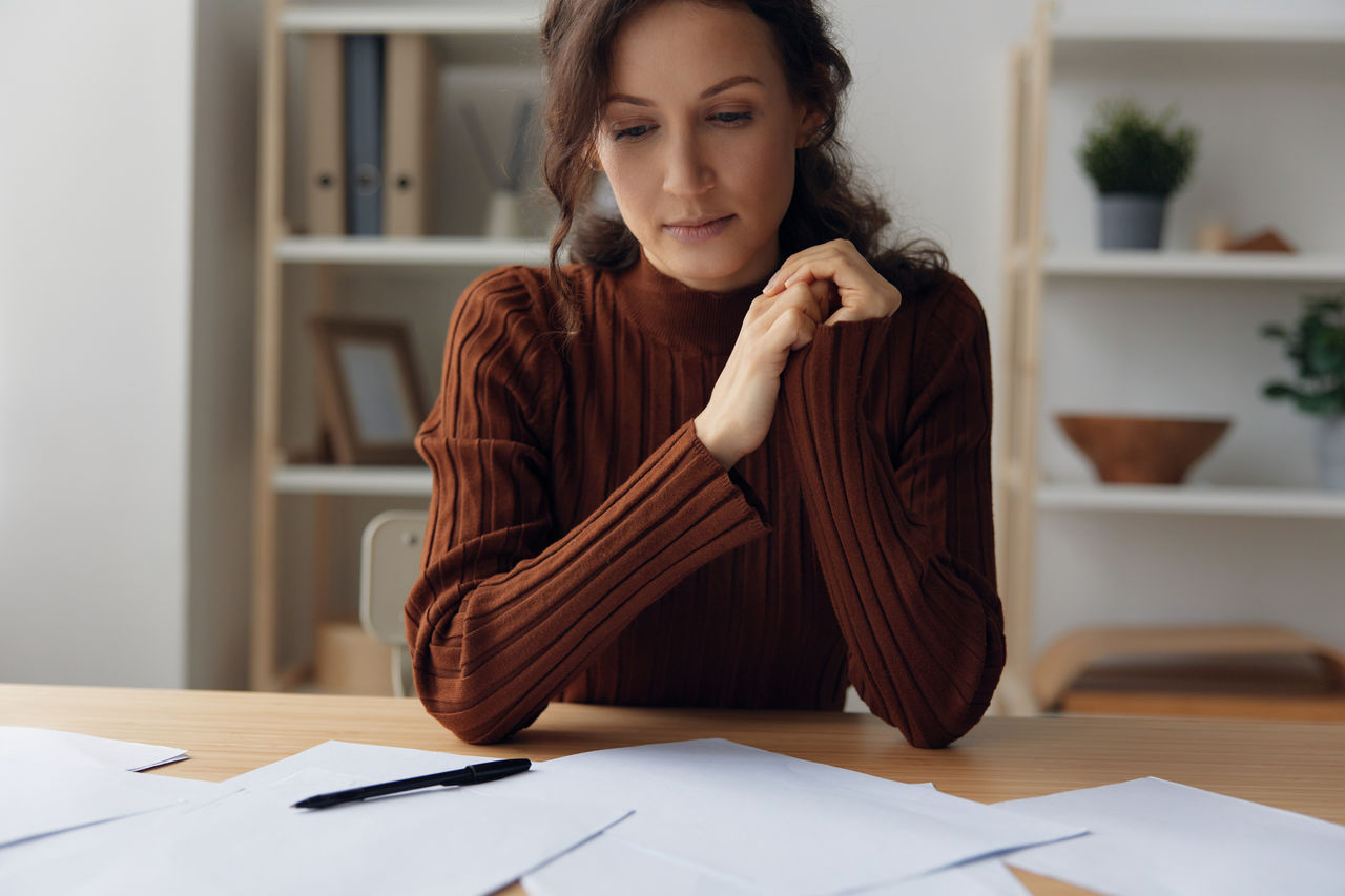 portrait of young woman working on table