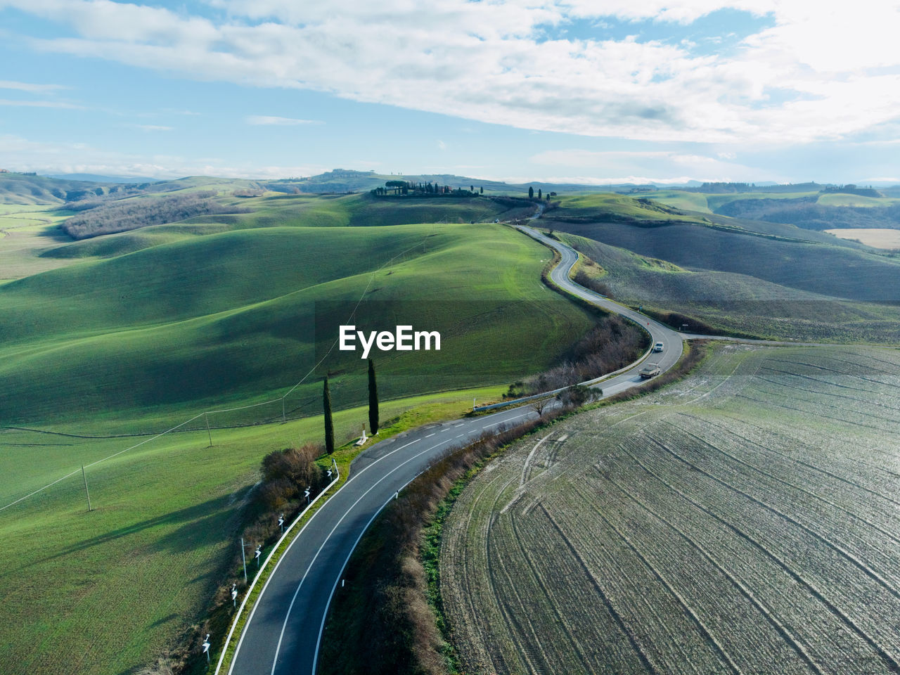 High angle view of road amidst landscape against sky