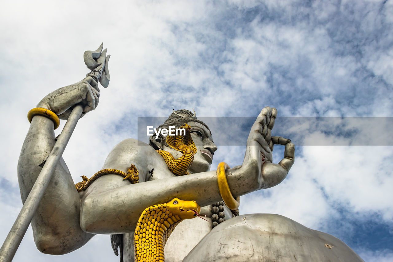 Shiva statue isolated at murdeshwar temple close up shots from low angle