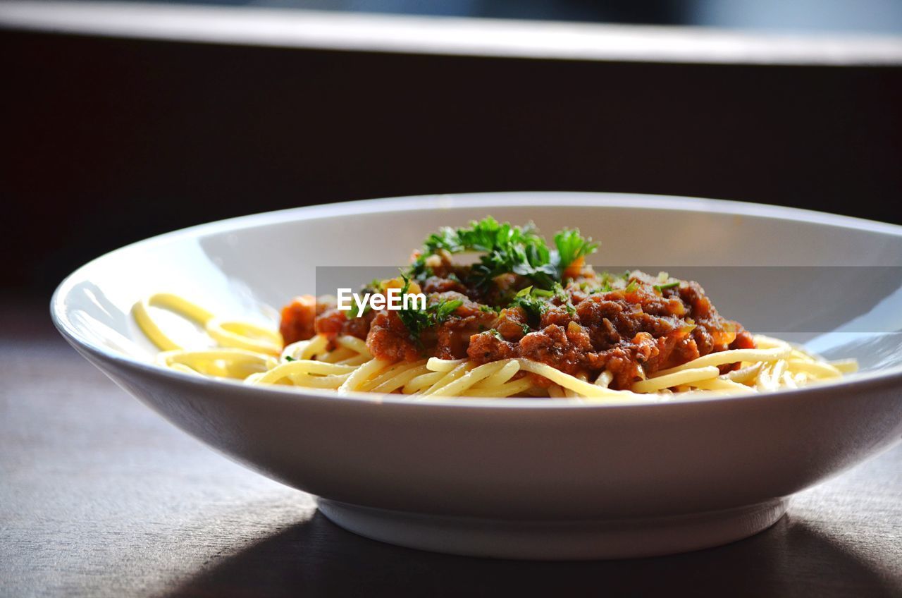 Close-up of noodles in bowl on table