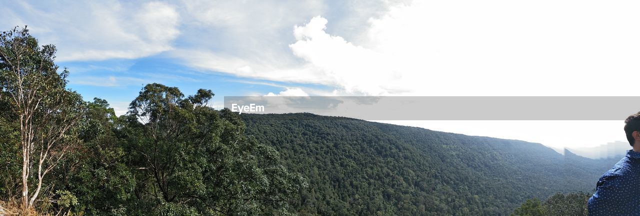 SCENIC VIEW OF MOUNTAIN AGAINST SKY