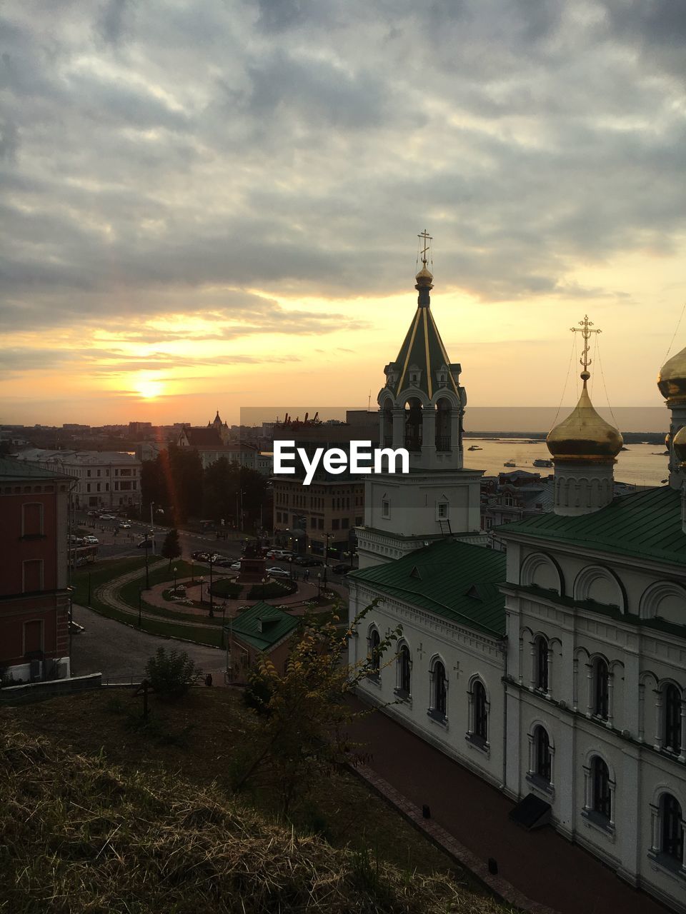 HIGH ANGLE VIEW OF CHURCH AT SUNSET