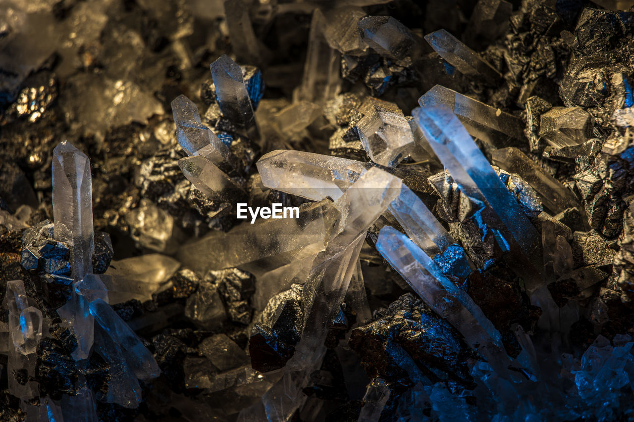 High angle view of crystals on rock