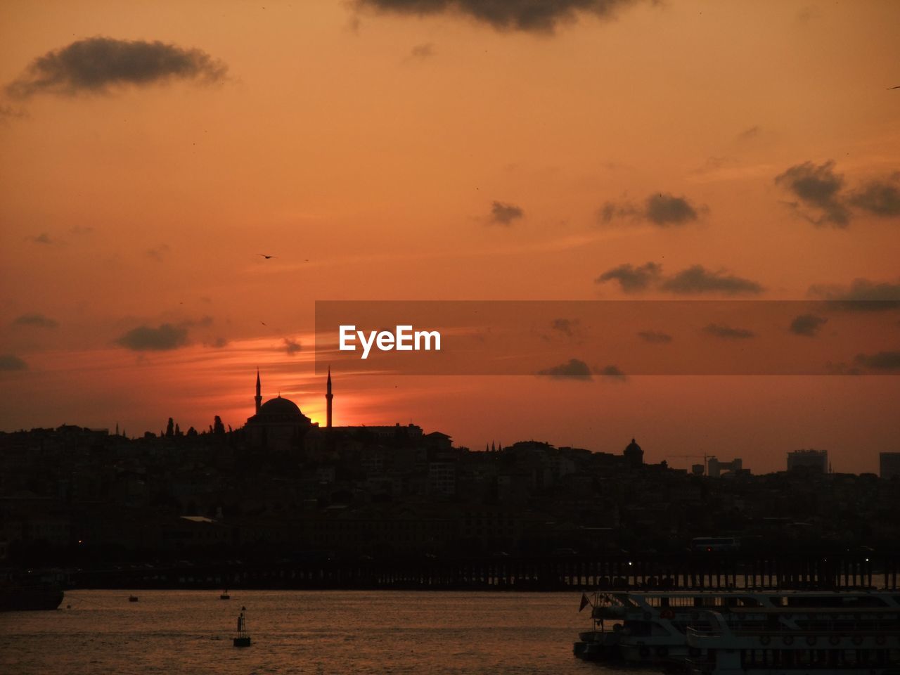 VIEW OF RIVER AT SUNSET