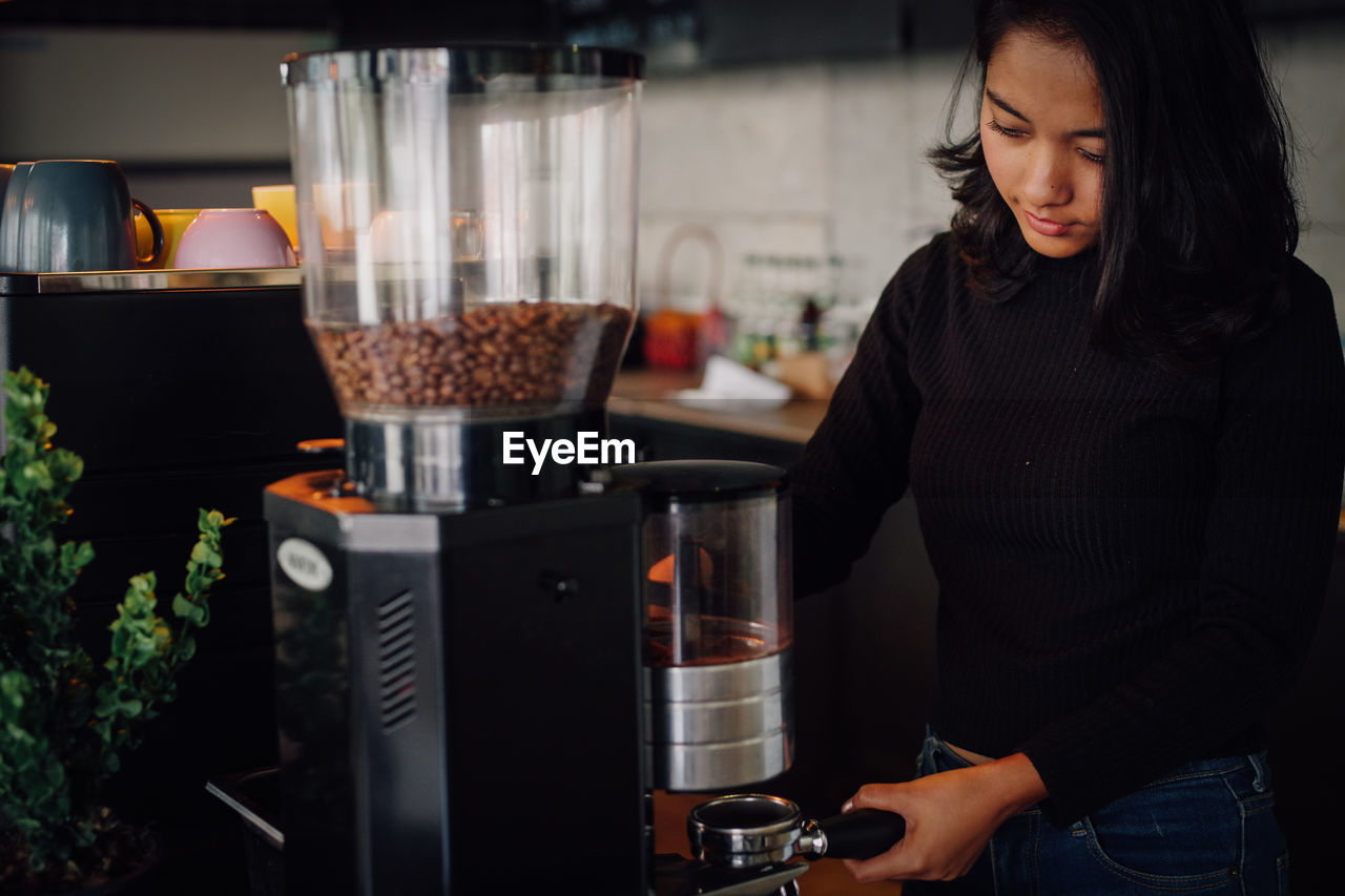 Barista working in cafe