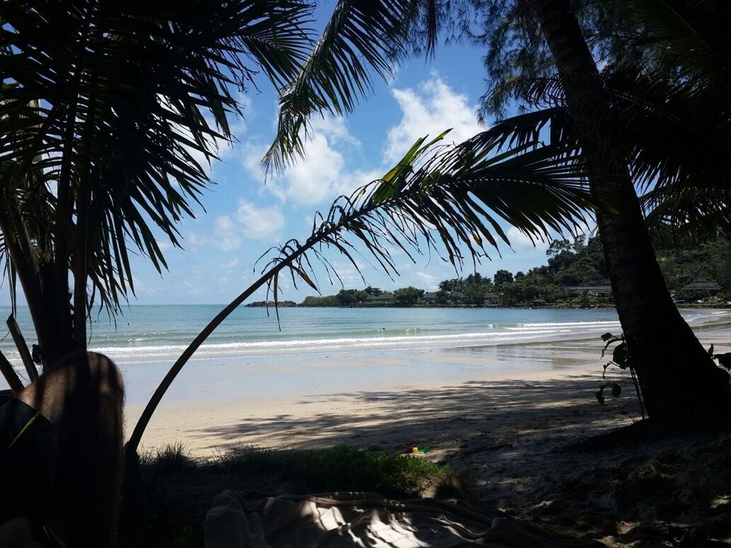 View of calm beach against the sky