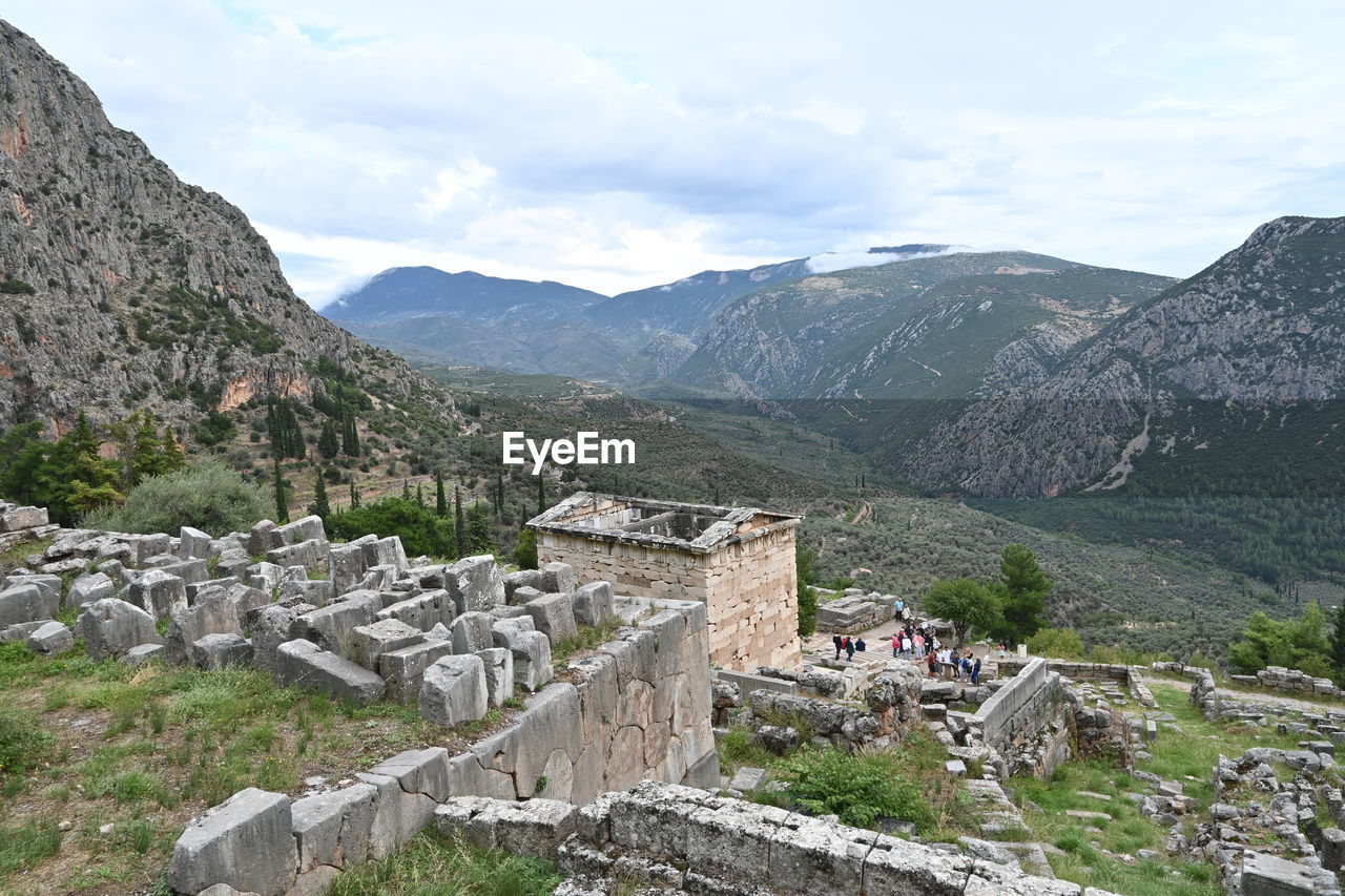 mountain, mountain range, architecture, scenics - nature, history, nature, environment, the past, built structure, travel destinations, landscape, sky, ancient, beauty in nature, travel, cloud, land, plant, tree, tourism, day, building exterior, mountain pass, no people, valley, outdoors, tranquility, building, tranquil scene, rock, old ruin, village, non-urban scene, walking, stone material, wall, ancient civilization, old, backpacking, high angle view, vacation, plateau, geology, adventure, town, stone wall, forest