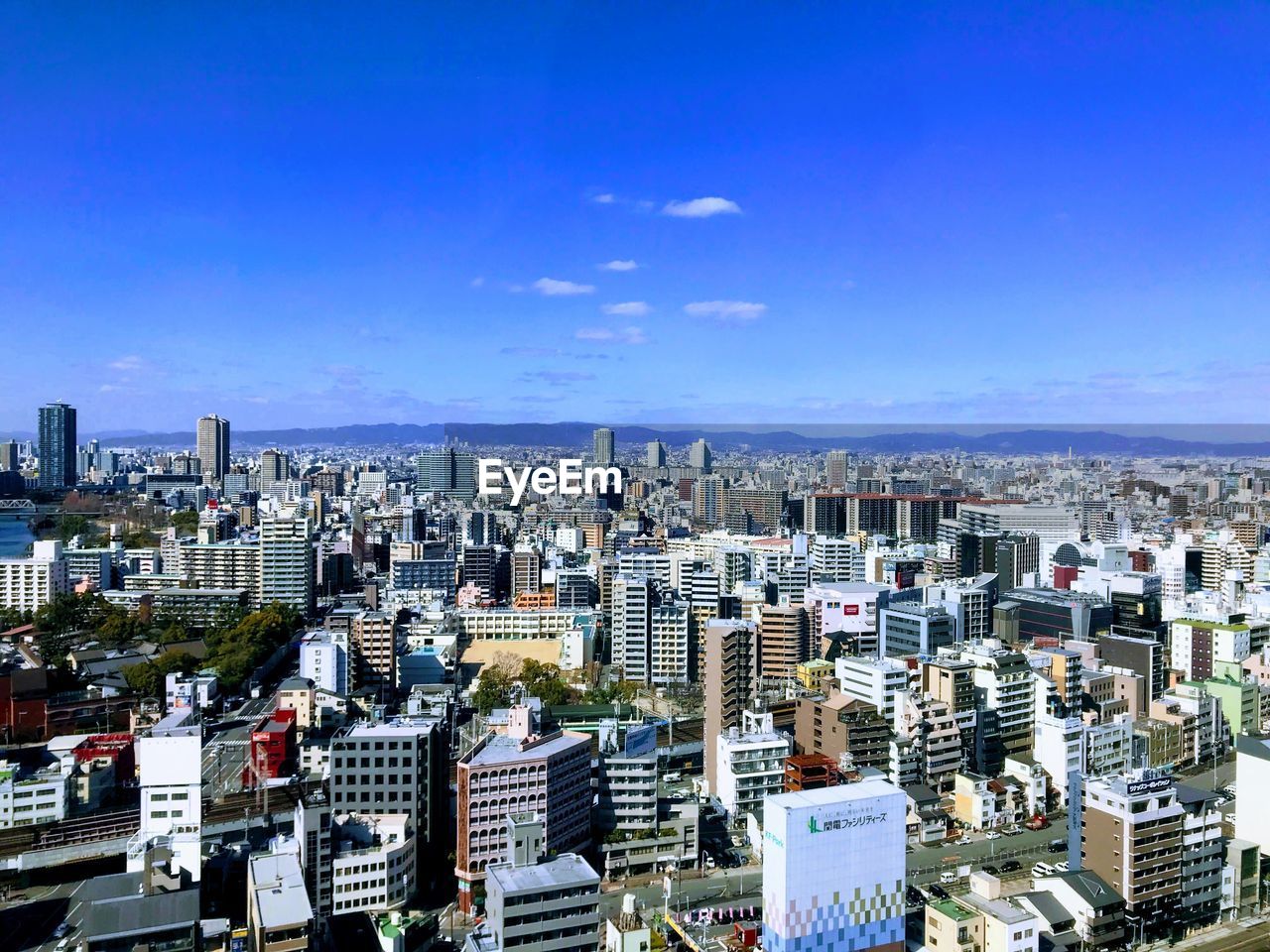 HIGH ANGLE VIEW OF MODERN BUILDINGS IN CITY