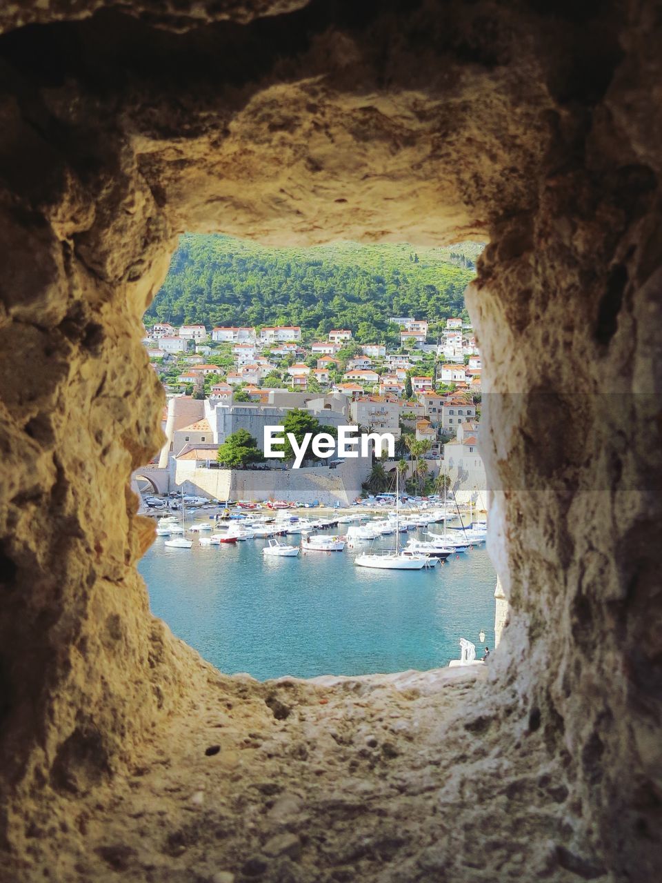 Residential district seen through stone window