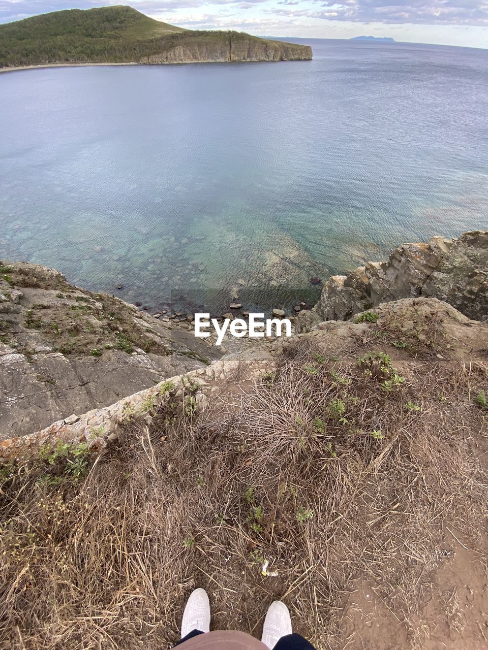 Low section of rocks by sea