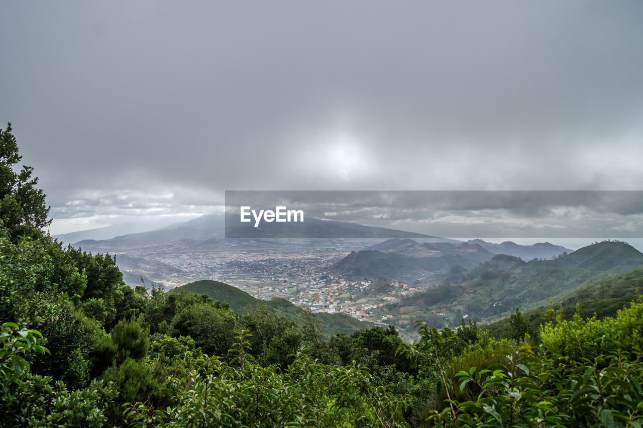 Scenic view of city and landscape against sky - las mercedes, tenerife