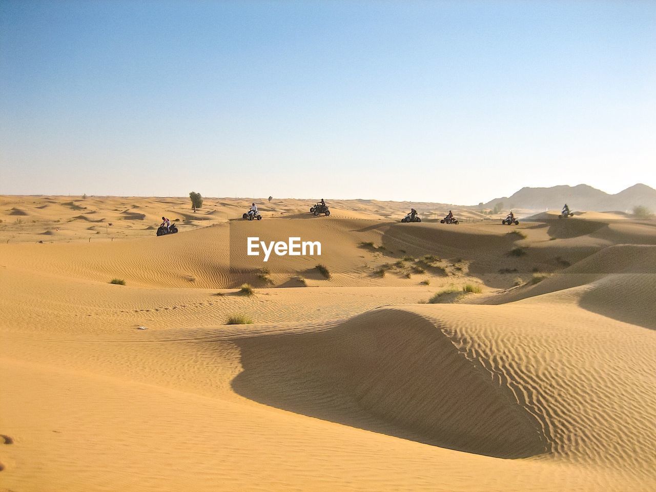 Scenic view of desert against clear sky