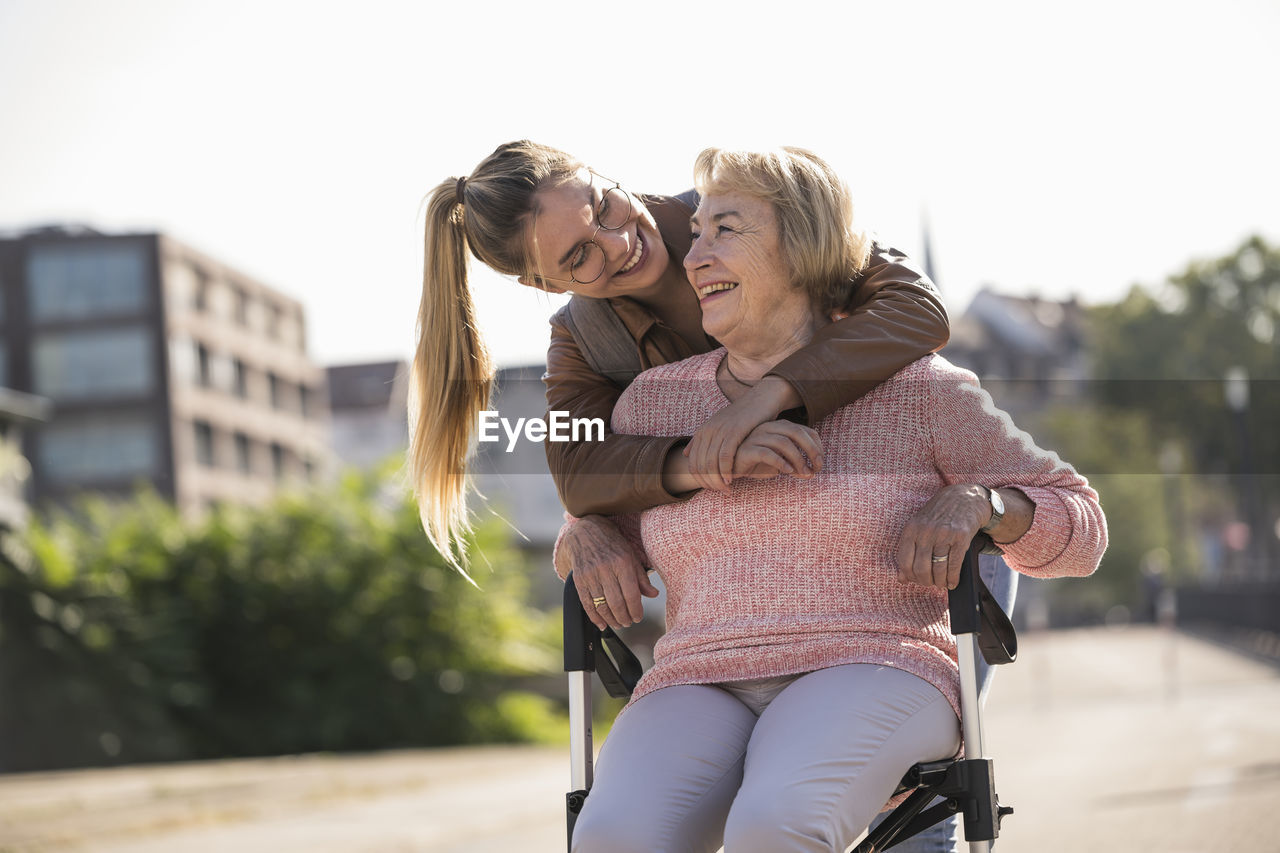 Granddaughter and her grandmother laughing