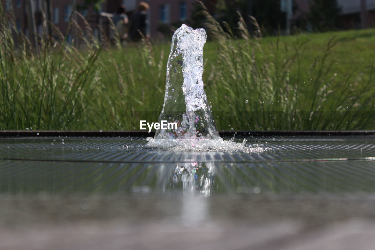 CLOSE-UP OF FOUNTAIN