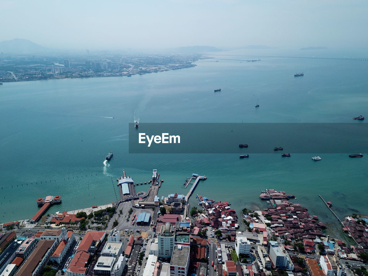 Aerial view two ferry move at penang sea.