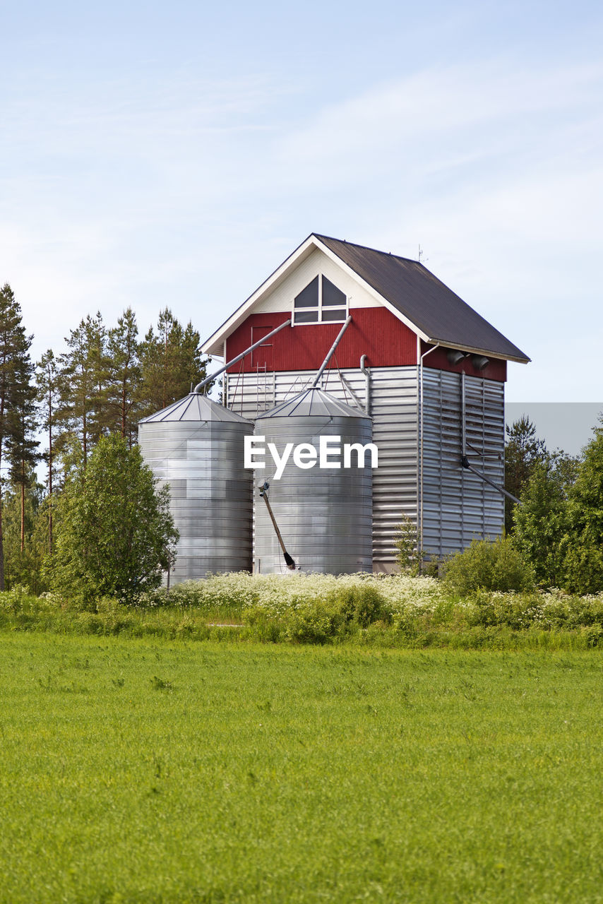 House with two silos connected