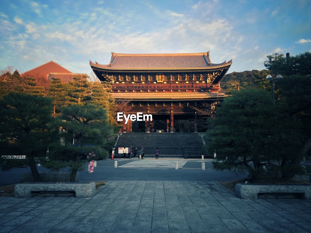 Temple amidst trees against sky