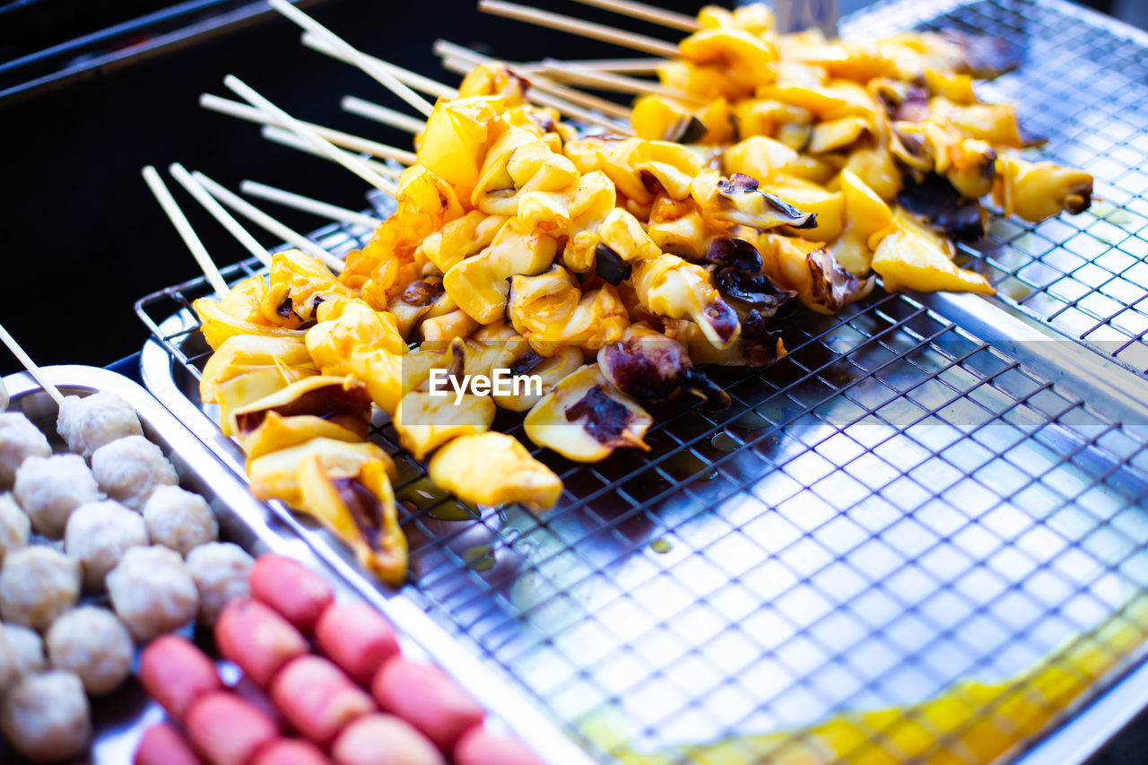 HIGH ANGLE VIEW OF VEGETABLES ON BARBECUE