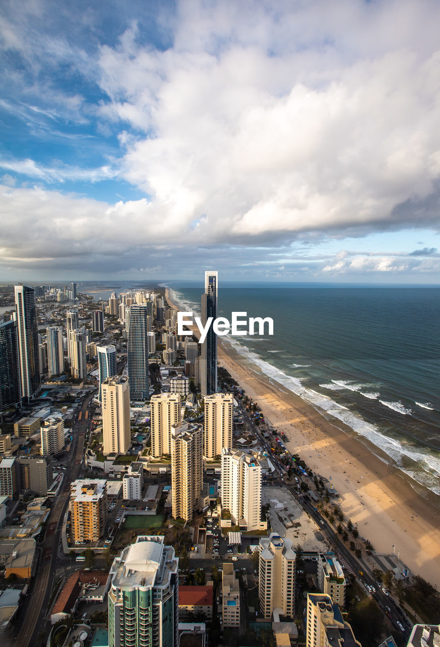 HIGH ANGLE VIEW OF BUILDINGS AGAINST SKY