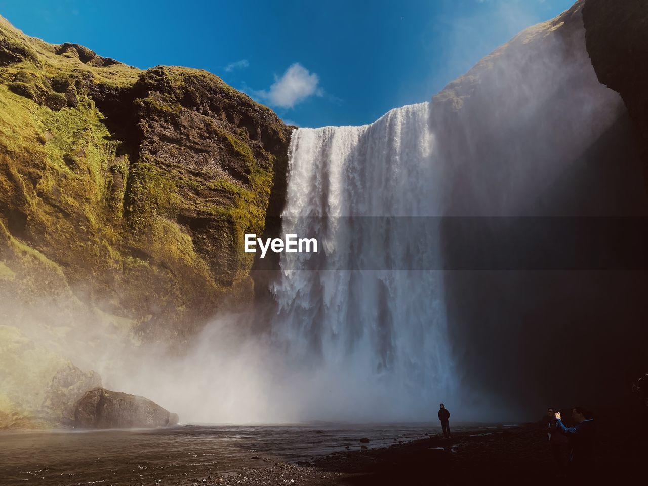 panoramic view of waterfall against sky