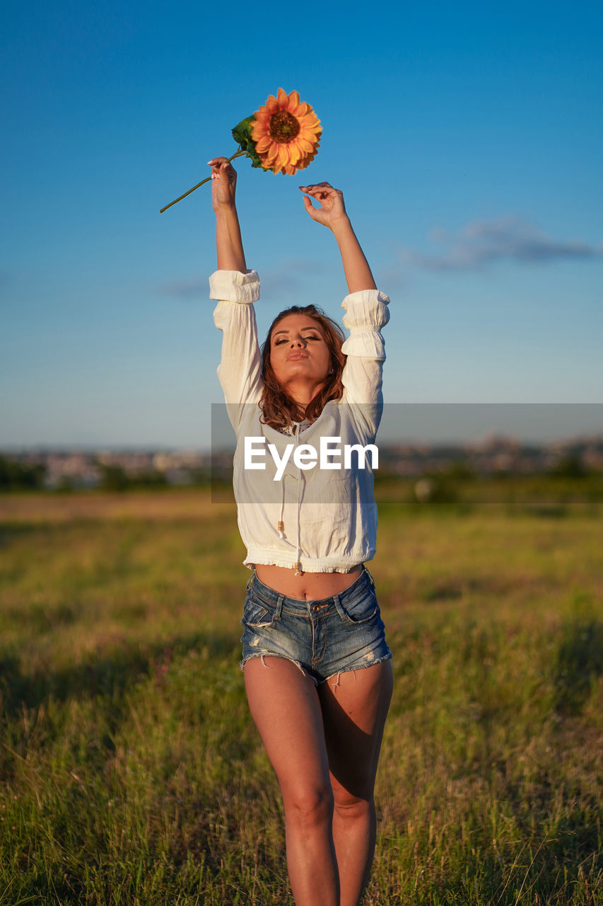 Full length of woman standing on land