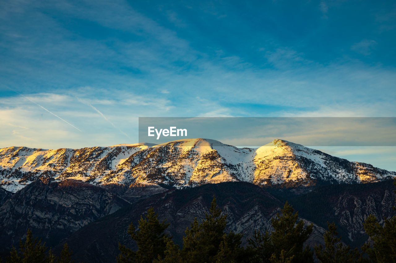 SCENIC VIEW OF MOUNTAIN AGAINST SKY