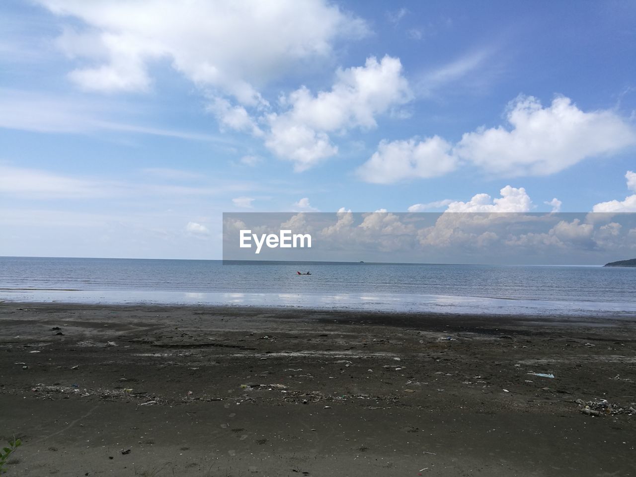 VIEW OF BEACH AGAINST SKY