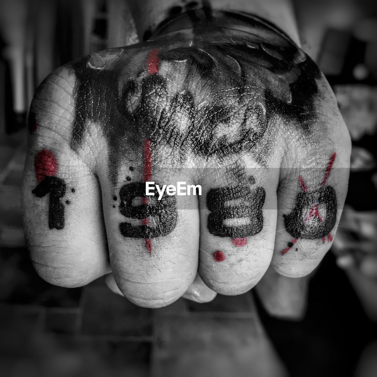 Close-up of tattoo on human fist