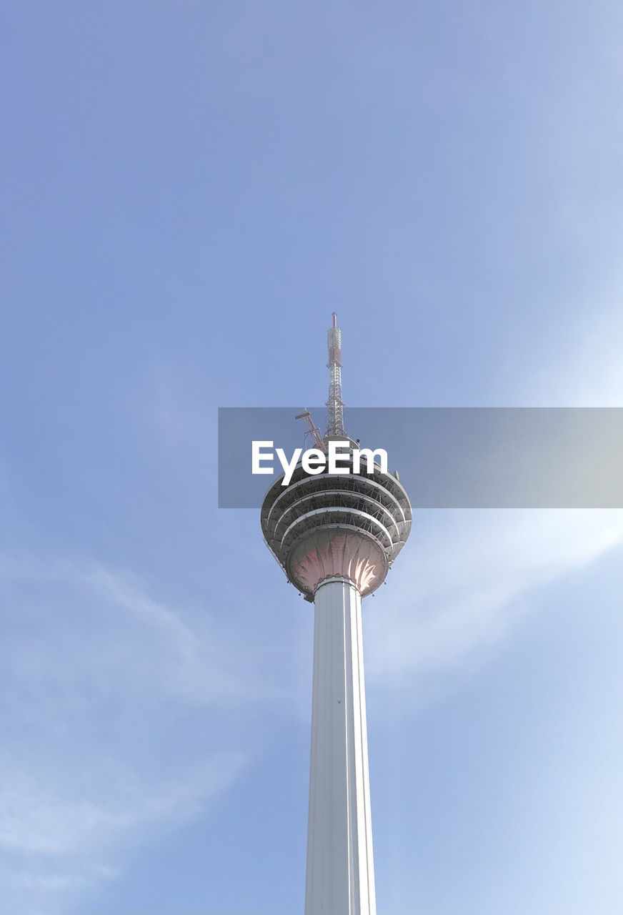 Low angle view of kl tower against sky.