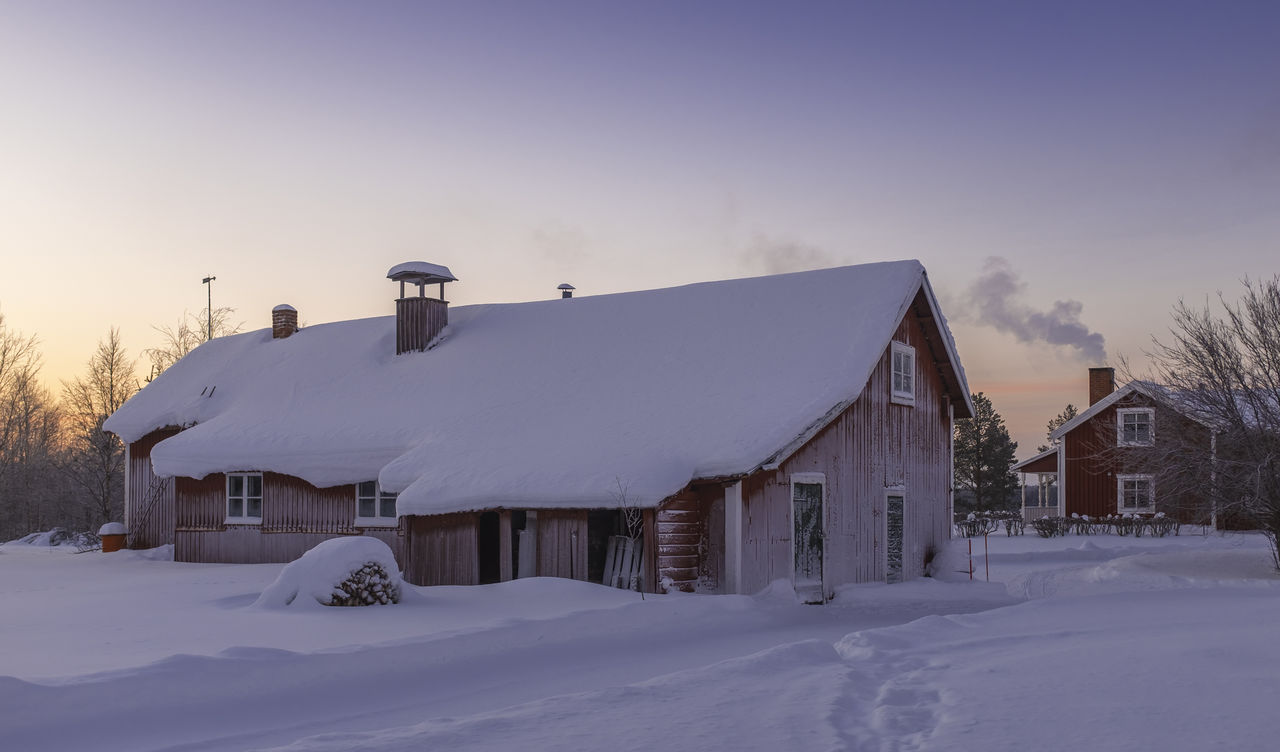 SNOW COVERED BUILT STRUCTURE