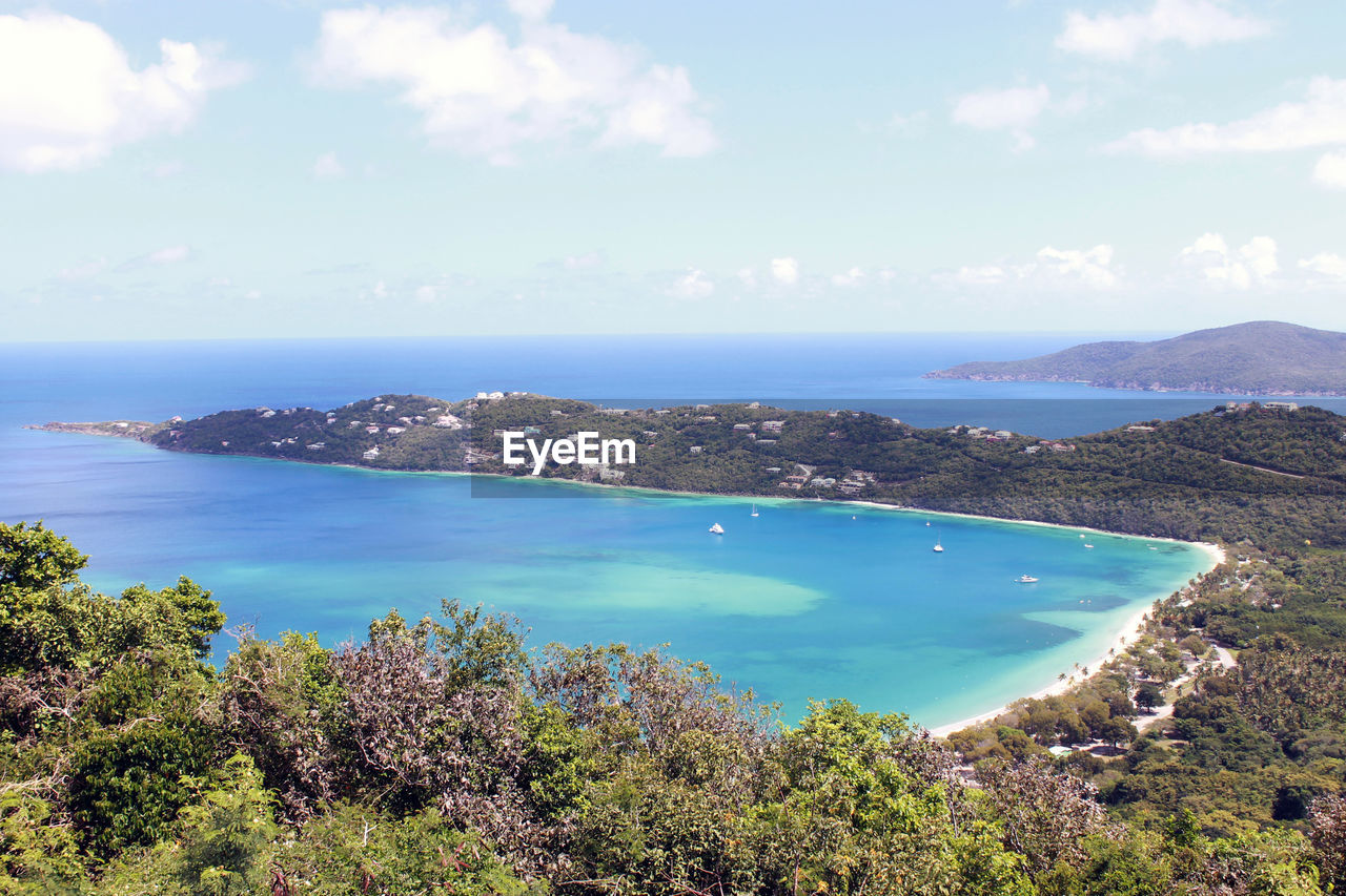 High angle view of swimming pool and sea against sky