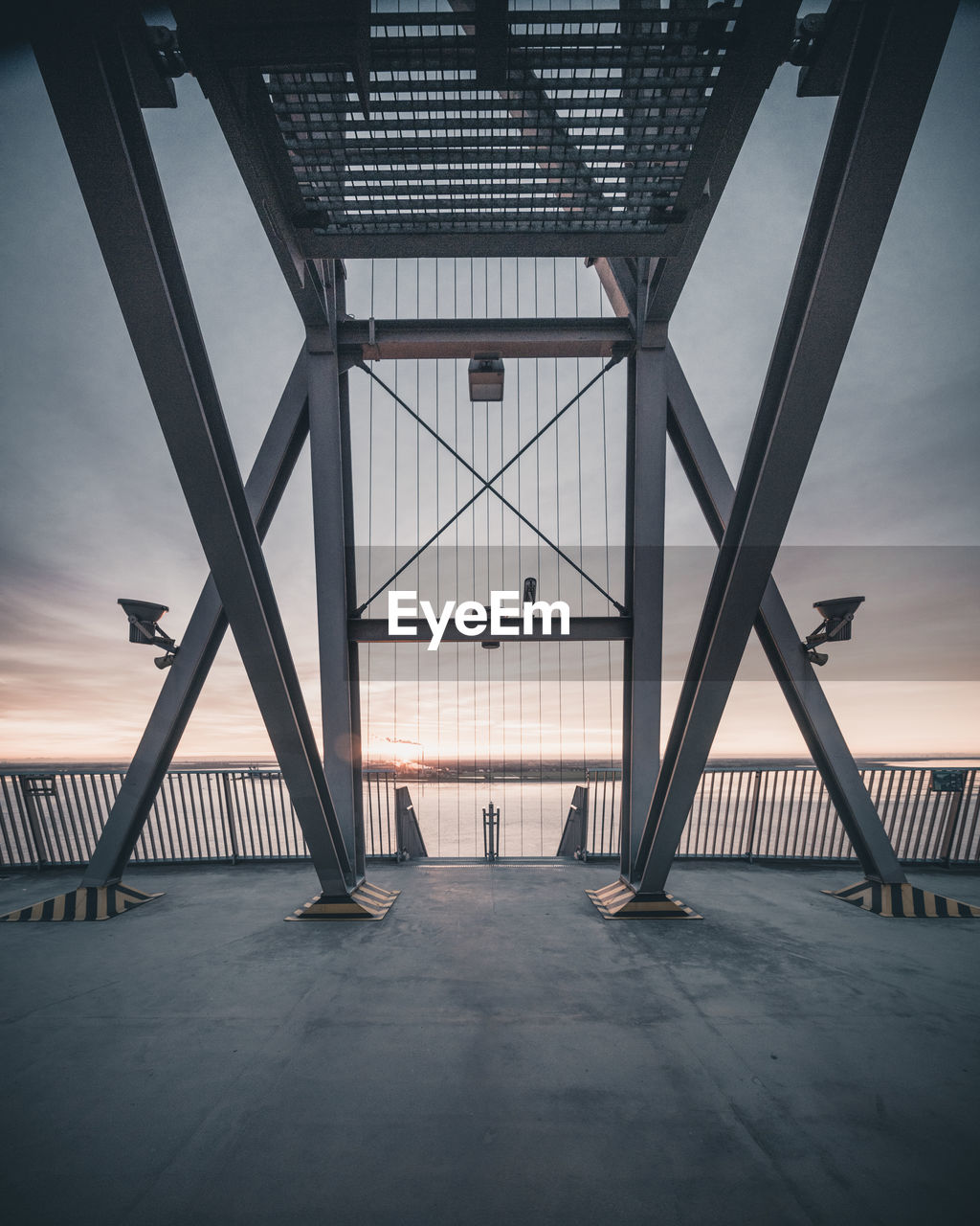 Bridge against sky at sunset