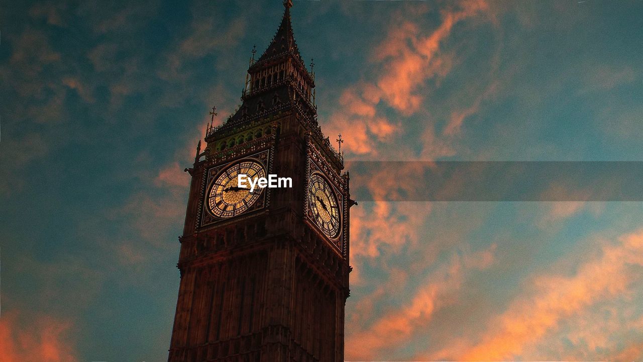 Low angle view of big ben against sky during sunset