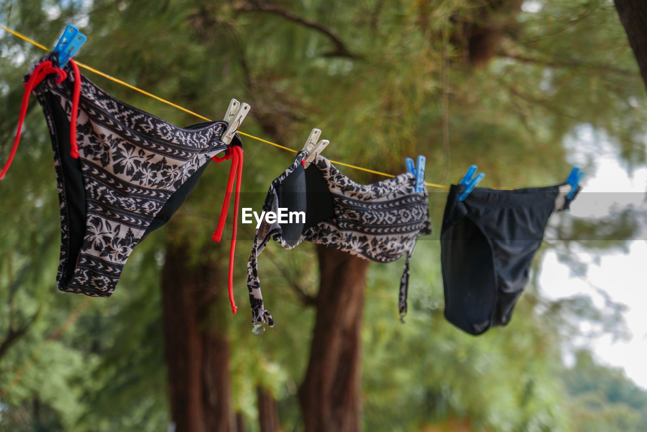 CLOTHES DRYING ON ROPE