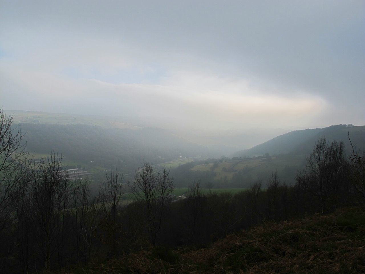 SCENIC VIEW OF MOUNTAINS AGAINST SKY AT WINTER