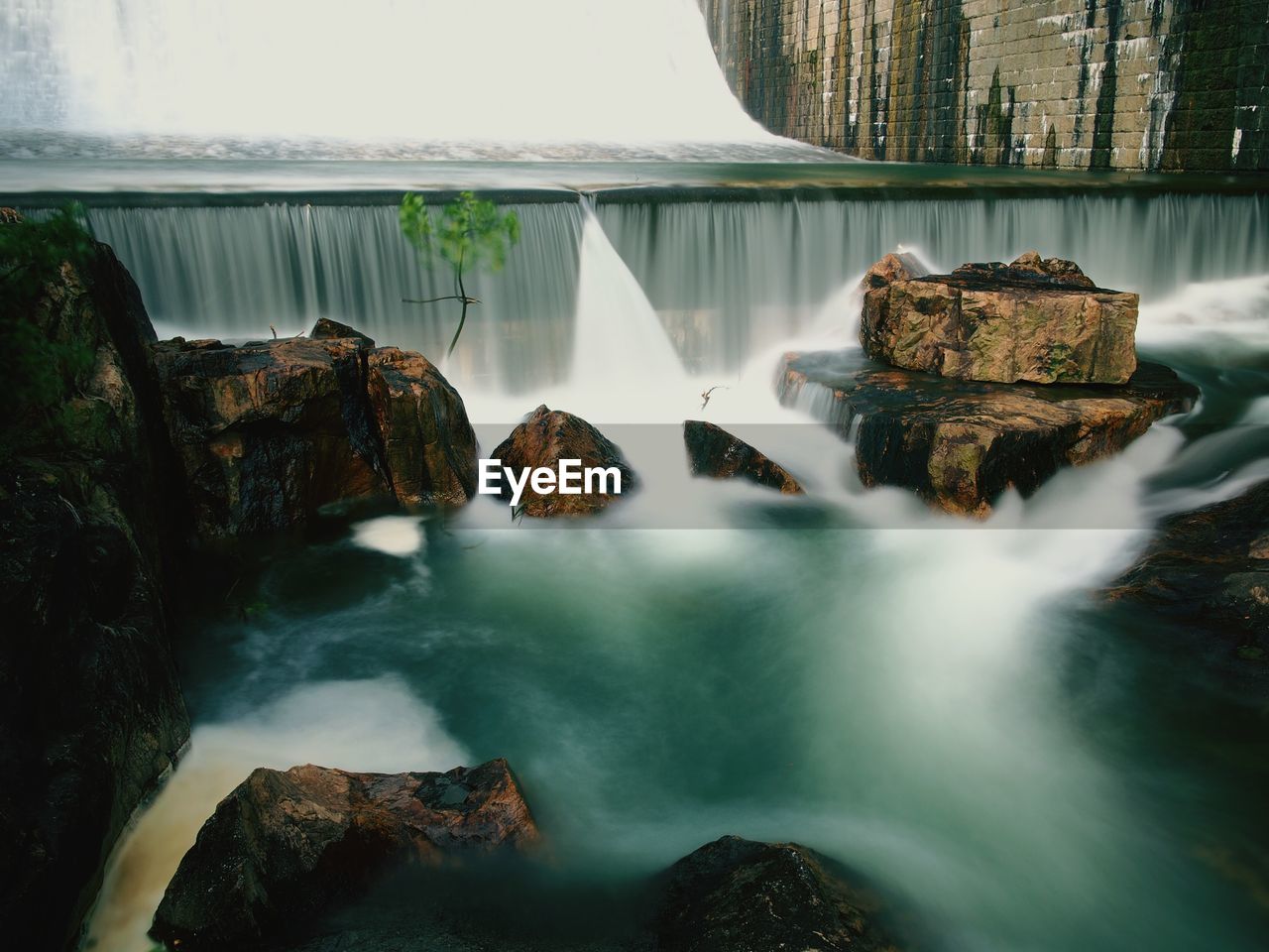 Stream flowing through rocks