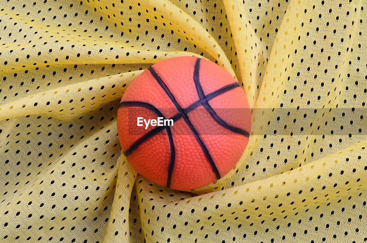Directly above shot of basketball on textile