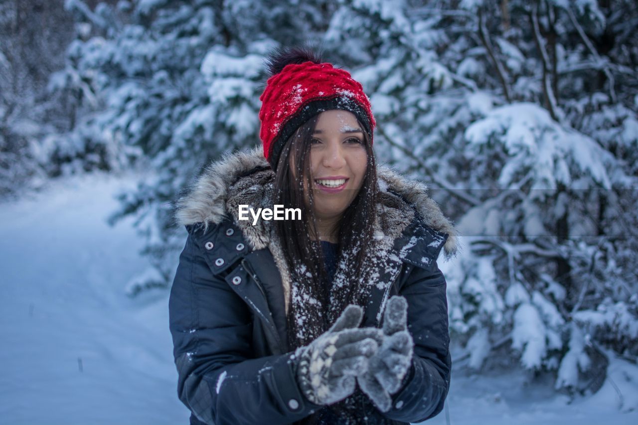 Woman wearing winter gear in snow