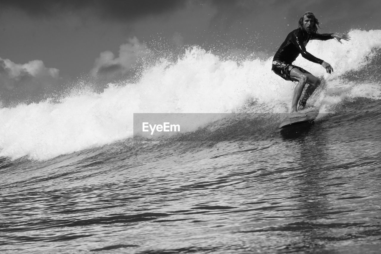 Man surfing in sea