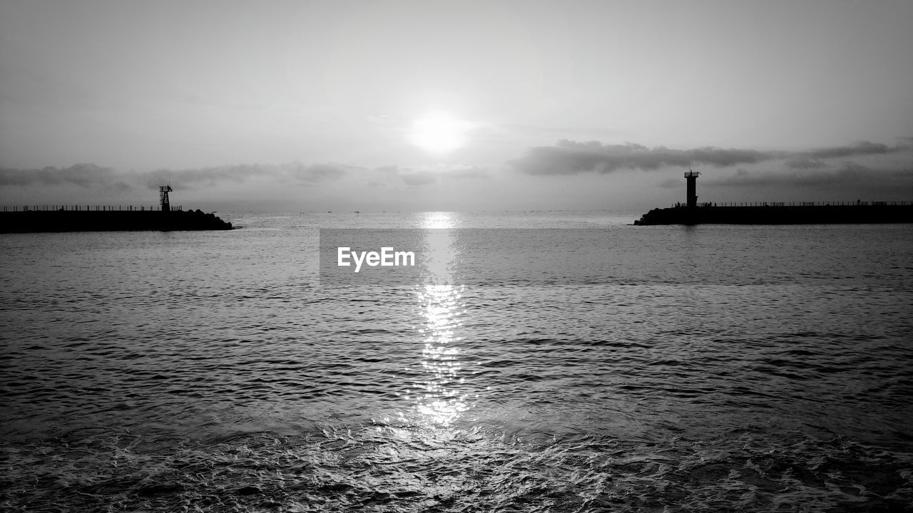 Scenic view of sea against sky during sunset