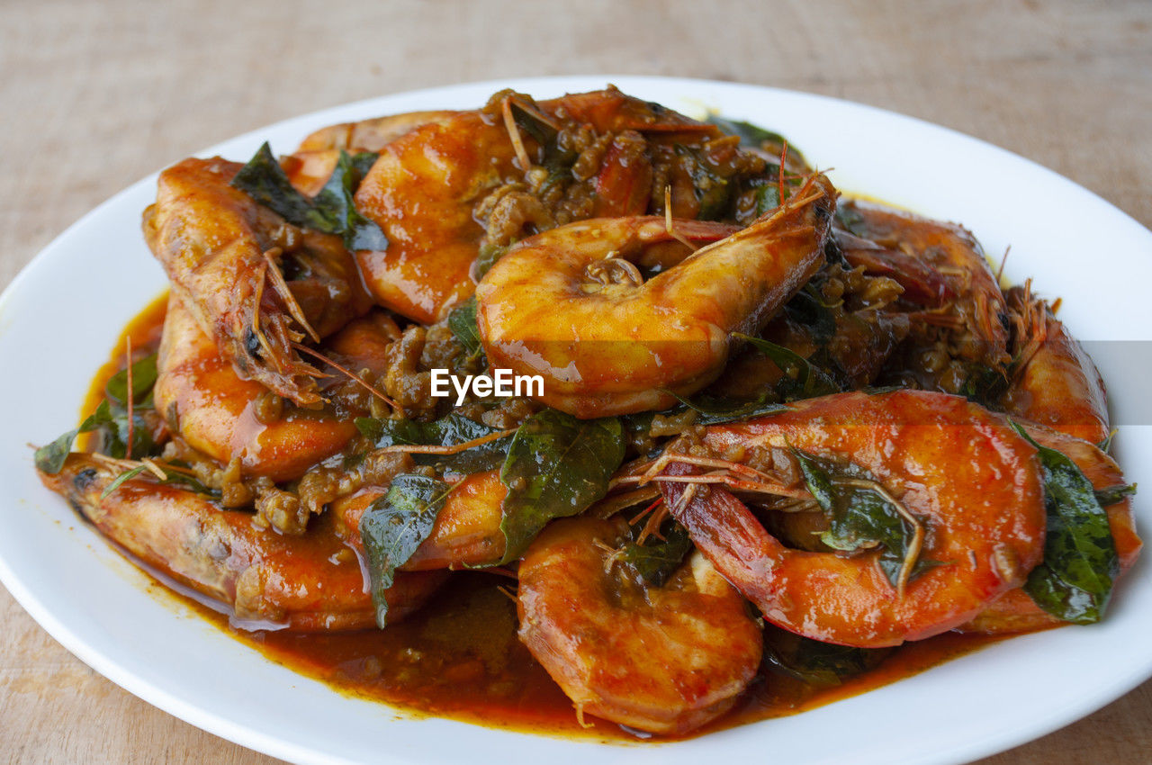 food, food and drink, healthy eating, plate, wellbeing, shrimp, freshness, dish, meal, seafood, produce, table, vegetable, no people, meat, cuisine, indoors, close-up, dinner, herb, curry, spice, savory food, fruit, cooked, crustacean, high angle view, stew, still life