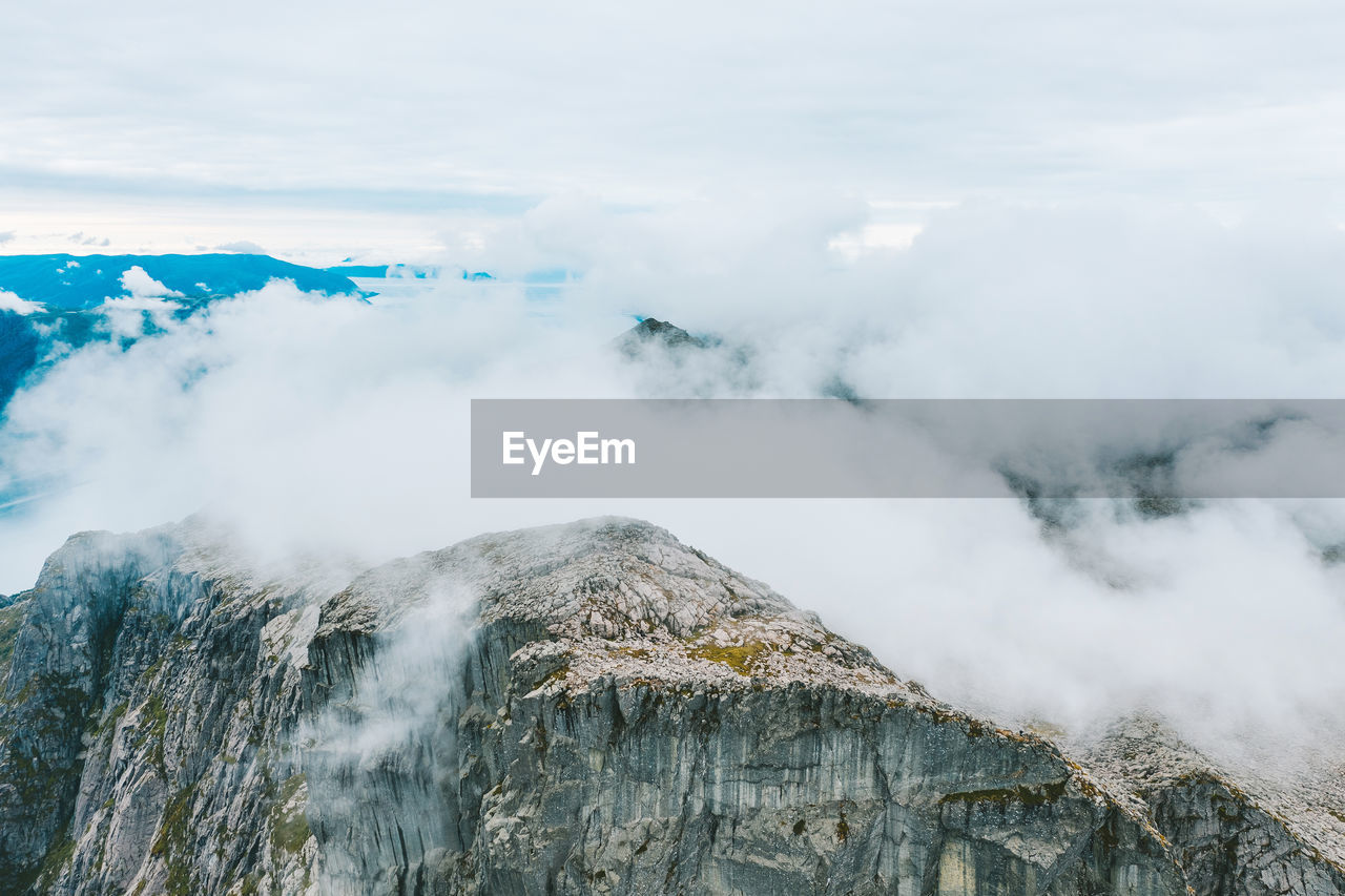 Aerial view of mountain by sea