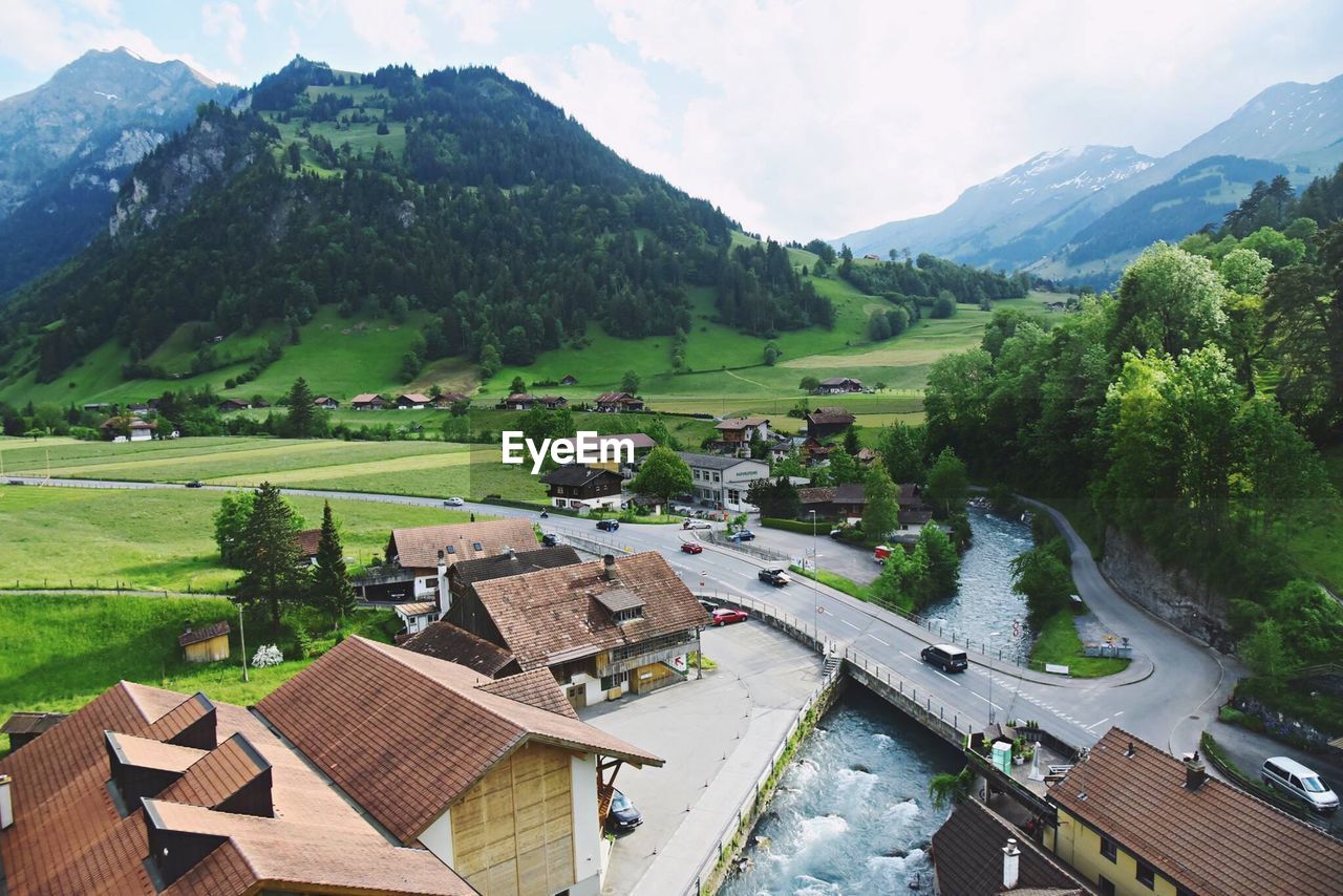 Scenic view of landscape and mountains against sky