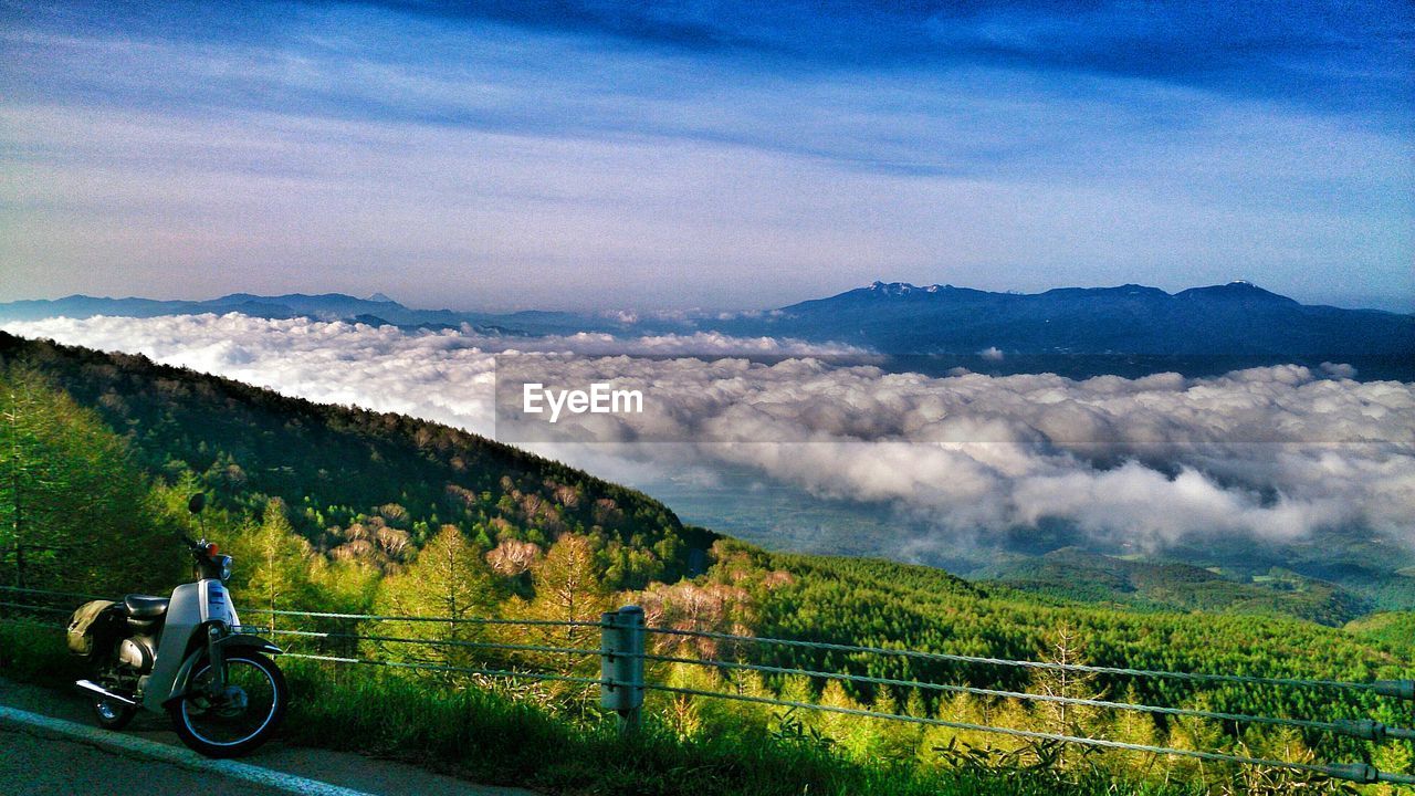 Scenic view of clouds and mountains