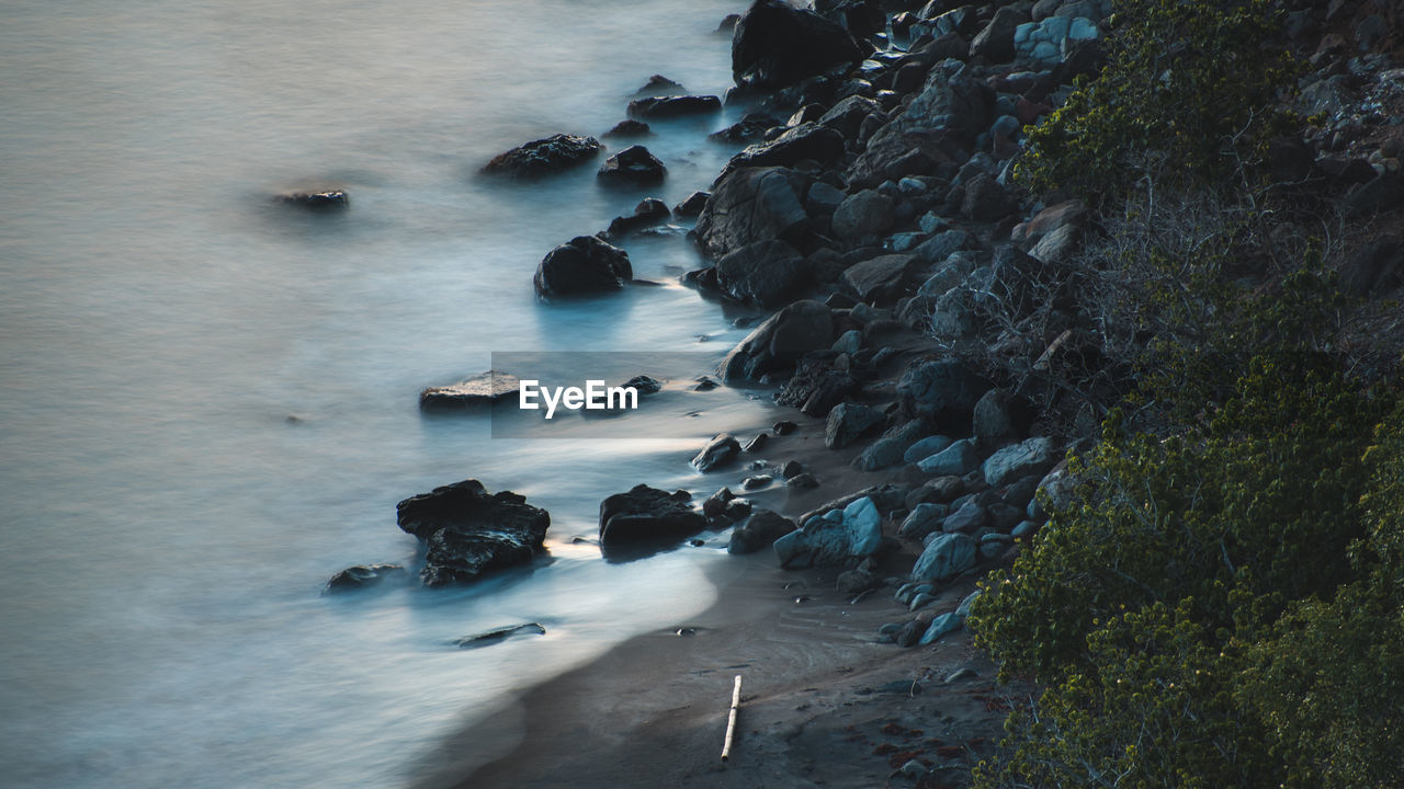 High angle view of rocks on beach