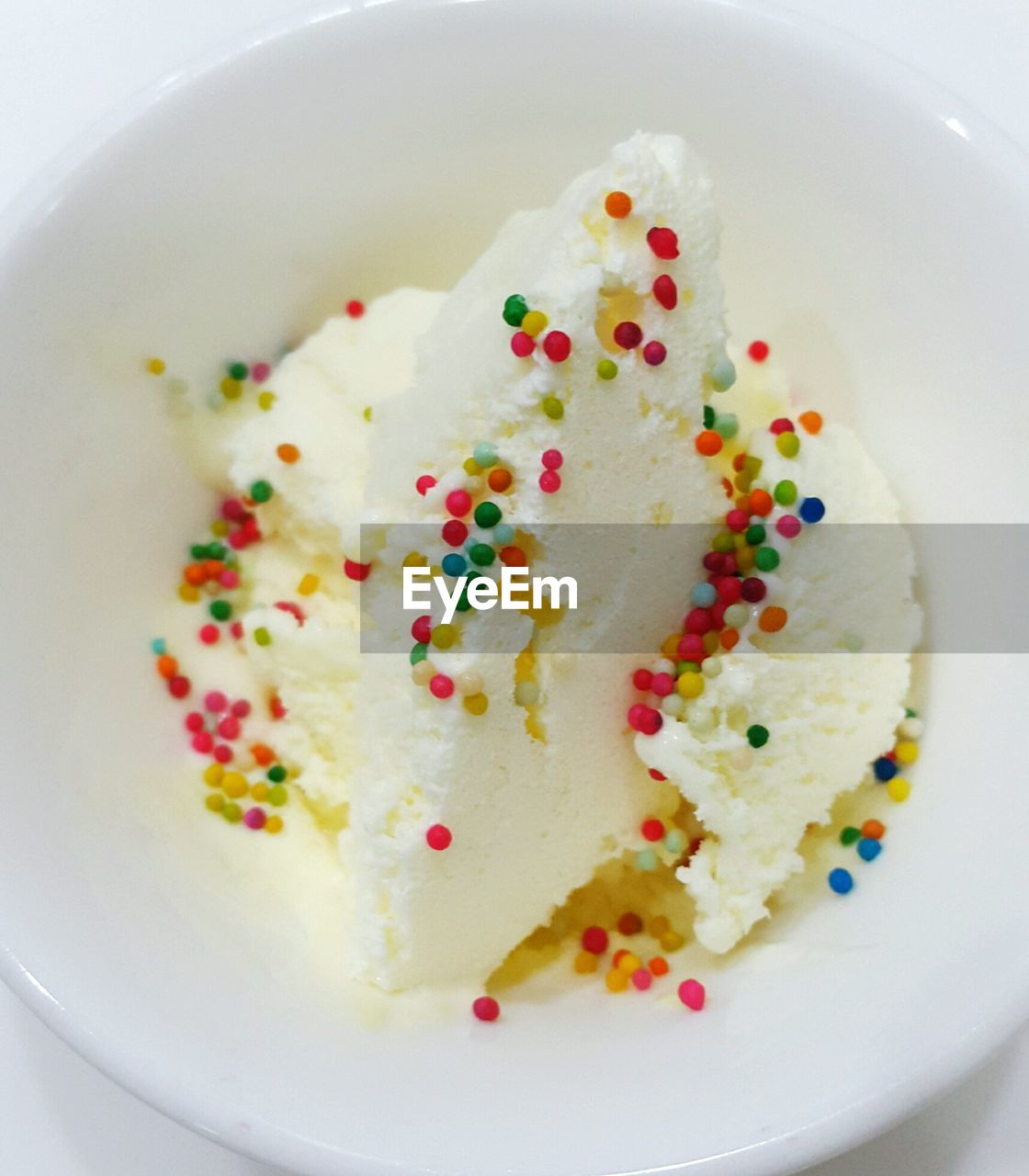 Directly above view of colorful sprinkles on ice cream
