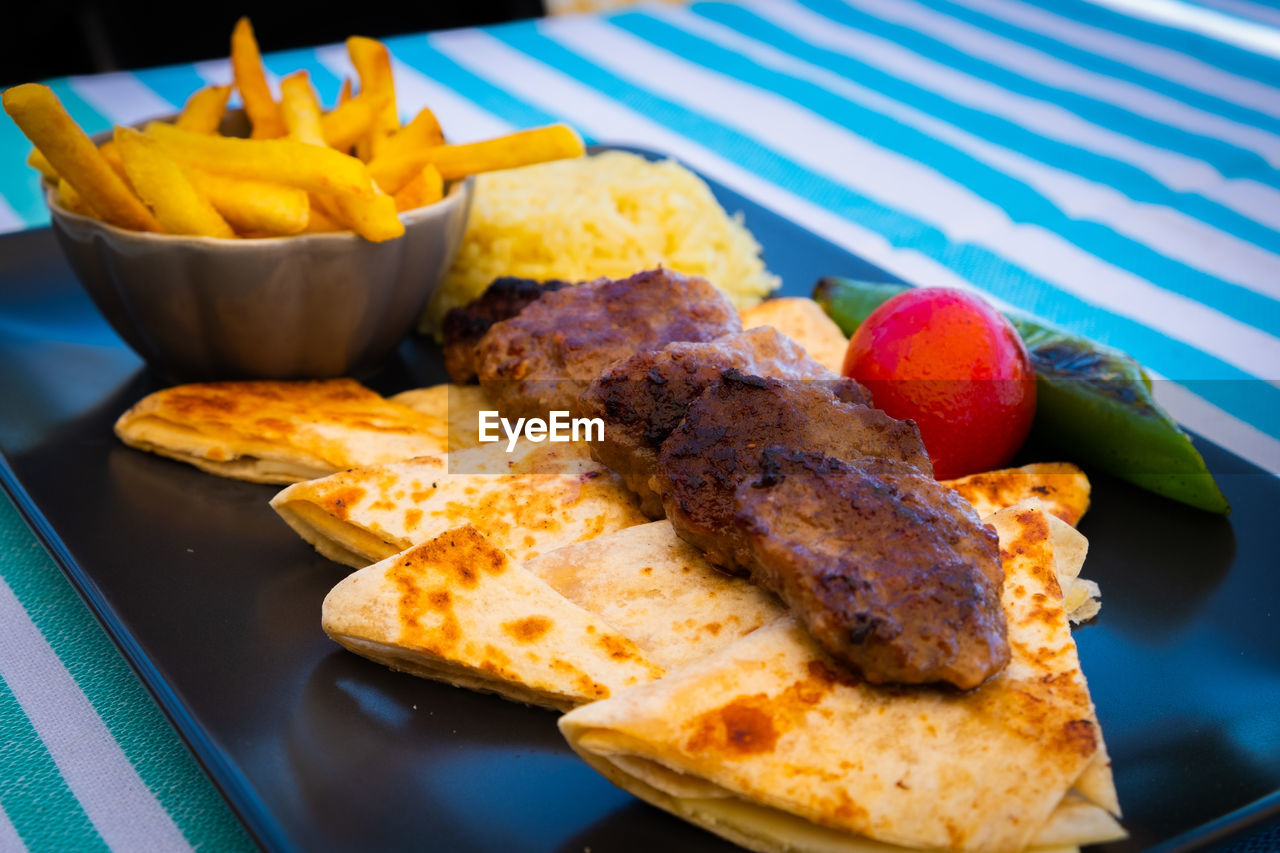 Close-up of food served on table